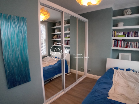 Fitted Wardrobe with Anthracite Frame and Grey Mirror Doors.