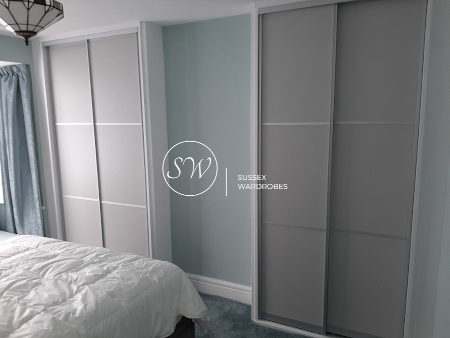 Fitted Wardrobe with Anthracite Frame and Grey Mirror Doors.