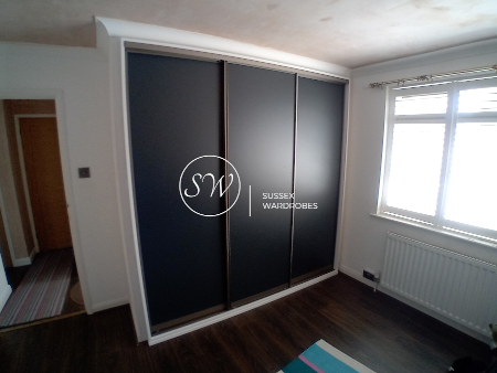 Hinged to Sliding Wardrobe Conversion in Hove