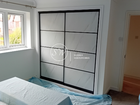 Marble Effect Fitted Wardrobe Doors.